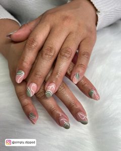 White Nails With Squiggly Lines On Both Hands
