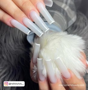 White Outline Nail Holding Fur