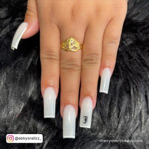 White Outline On Nails And Design On One Finger