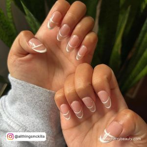 White Outline On Nails In Oval Shape