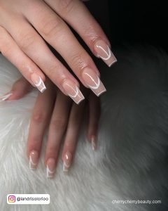 White Outlined Coffin Nails For A Simple Look
