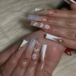 White Rhinestone Nails With A Touch Of Gold