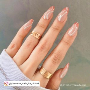 White Swirl Almond Nails With Pink Tips