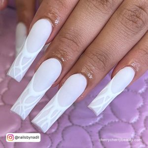 White Swirl Coffin Nails With A White Base Coat