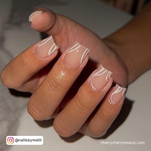 White Swirl Nails Coffin With Nude Base