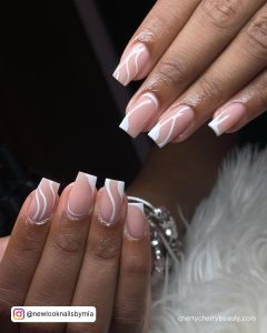 White Swirl Nails Coffin With Nude Base