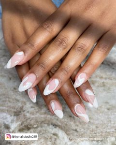 White Swirl Nails With A Clear Base