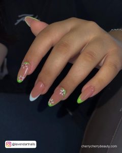 White Tip Nails With Flower On Oval Shaped Nails