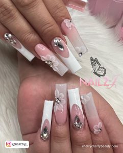 White Tip Nails With Rhinestones And Flowers