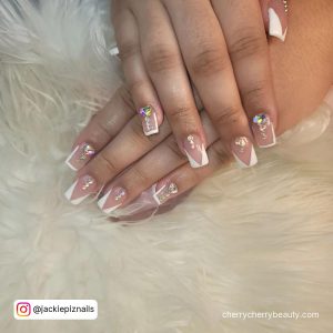 White Tip Nails With Rhinestones For A Bling Effect