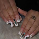 White Tip Nails With Rhinestones With Ring In One Finger