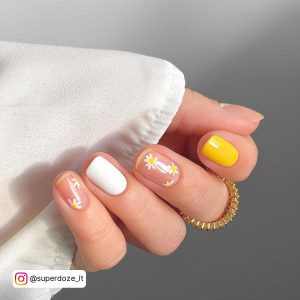 Yellow White Nails With Desihn On Clear Nails