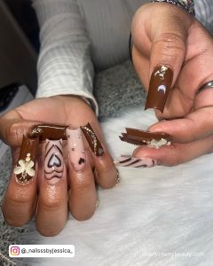 Acrylic Brown Nails With Hearts And Butterflies