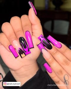 Acrylic Nail Art In Purple And Black