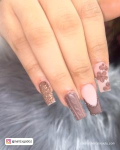 Acrylic Nails Brown With Flowers On One Finger