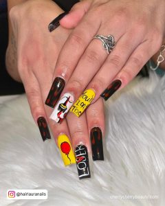Acrylic Nails Halloween Designs In Black, White And Yellow