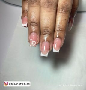 Acrylic Nails Nude Short With A Heart On Ring Finger