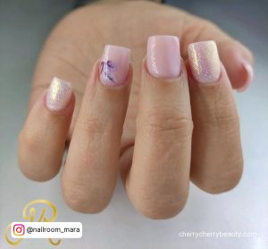 Acrylic Nails Pastel Pink With Glitter And Design On One Finger