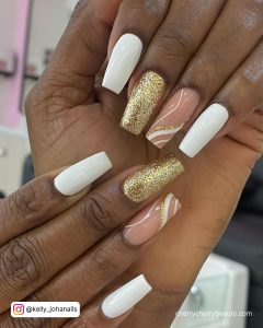 Acrylic Nails With Gold Flakes On White And Nude Combination