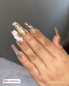 Acrylic Nails With Gold Foil And Flowers