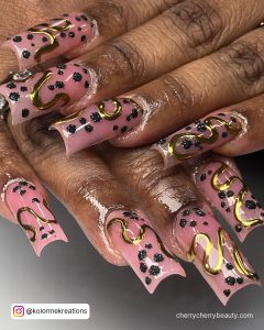 Acrylic Pink And Gold Nails With Dots And Spirals