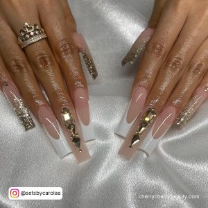 Acrylic Rose Gold Nails With Rhinestones And White Tips