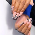 Adorable Medium-Length Square Acrylic Nails With Cartoon And Swirly Design Designs Over White Surface