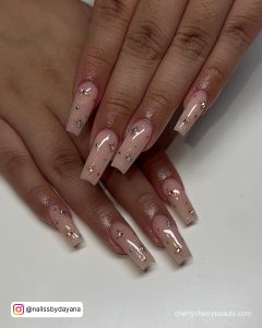 Beige And Gold Acrylic Nails In Coffin Shape