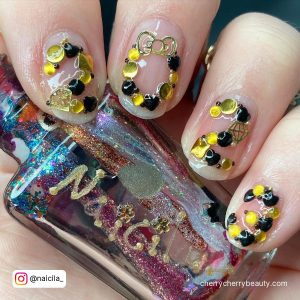 Black And Gold New Years Nails