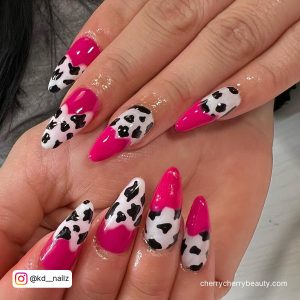 Black And Pink Cow Print Nails In Stiletto Shape