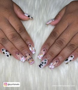 Black And Pink Cow Print Nails With Cow Drawn On One Finger