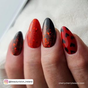 Black And Red Almond Nails