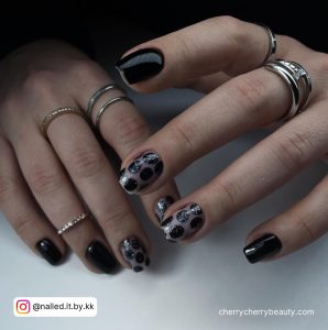 Black Nail Designs Short With Polka Dots On Two Fingers