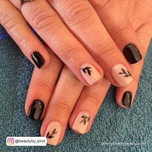 Black Short Coffin Nails With Stems On Two Fingers