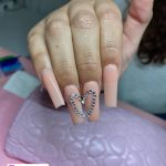 Bling Acrylic Cute Simple Nails Over Purple Surface