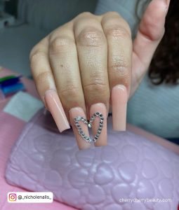 Bling Acrylic Cute Simple Nails Over Purple Surface