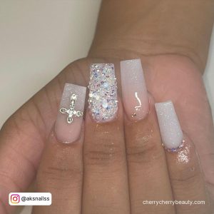 Bling Short Square Nails Acrylic Over White Surface