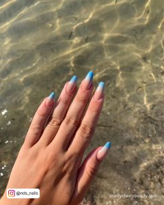 Blue Acrylic Ombre Nails In French Tip Design