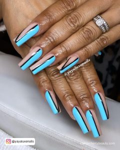 Blue And Nude Nails With Black Vertical Line On Nail