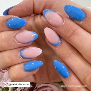 Blue Short French Tip Acrylic Nails Almond Shape Over Flowers