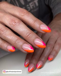 Bright Orange And Pink Nails In Stiletto Shape