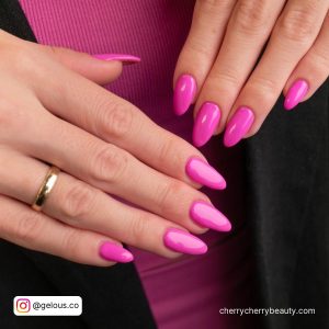 Bright Pink Almond Nails With Lighter Shade In The Middle