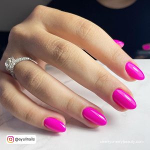 Bright Pink Long Nails In Almond Shape