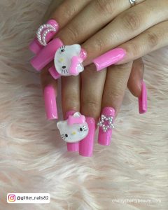 Bright Pink Nail Inspo With Hello Kitty Theme
