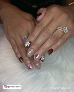 Brown Almond Acrylic Nails With Flowers