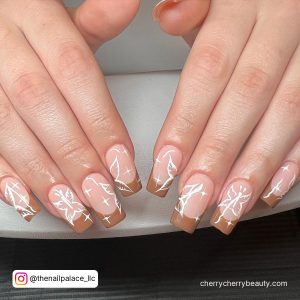 Brown And White Nails With Butterflies