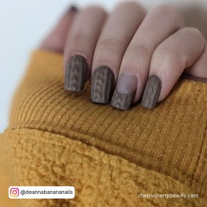 Brown Color Acrylic Nails With A Pattern