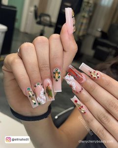 Christmas Acrylic Coffin Nails With Stones And Jesus And Saints Drawings