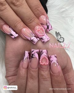 Chrome Pink Nails With Embellishments