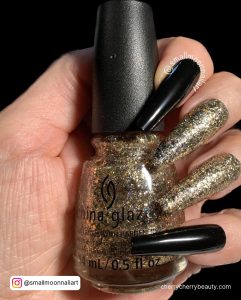 Classy Black And Gold Coffin Nails
